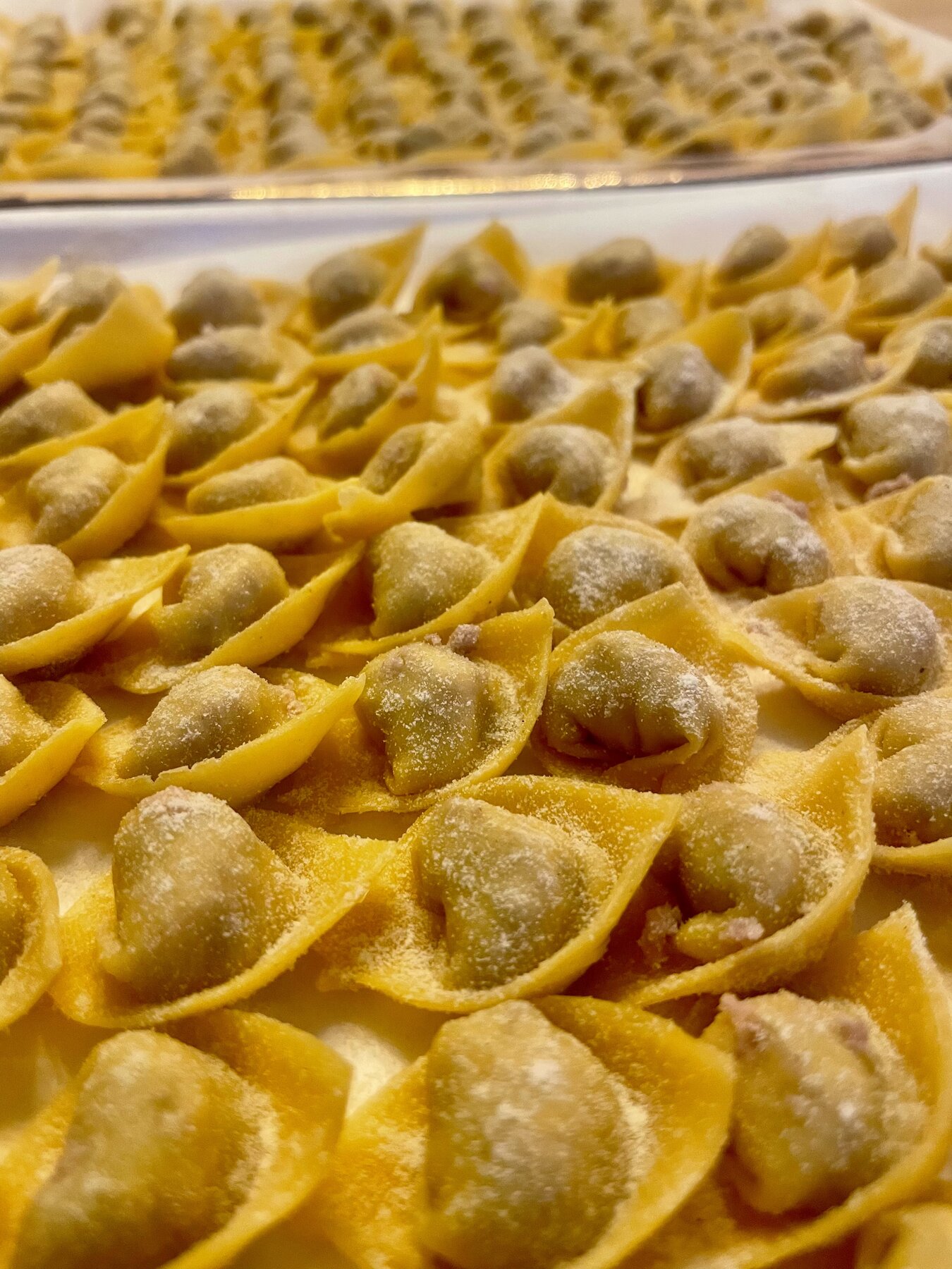 Handmade tortellini dusted with flour